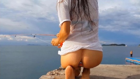 Pussy n Butt Plug FLASHING among fishermen # Public up dress NO PANTIES